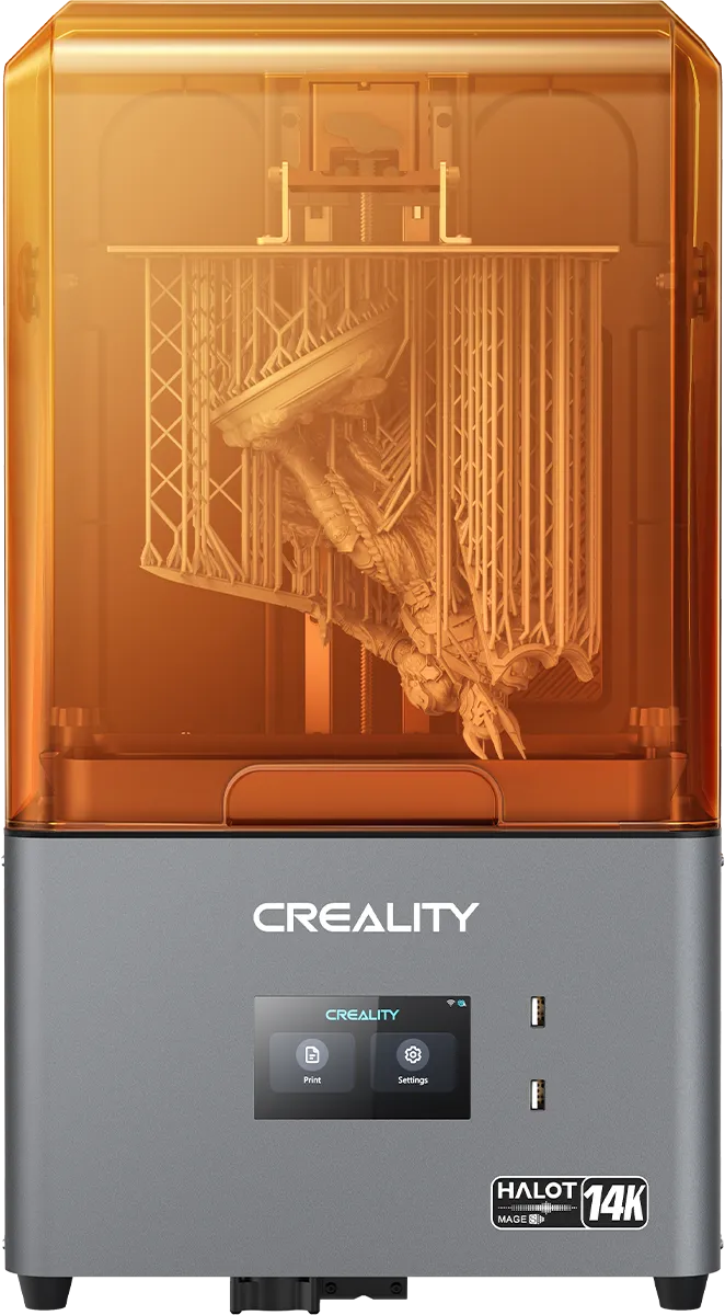 Close up of a 3D printer nozzle extruding green filament