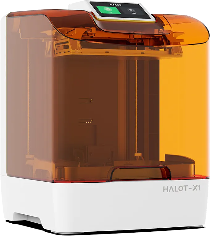 Close up of a 3D printer nozzle extruding green filament