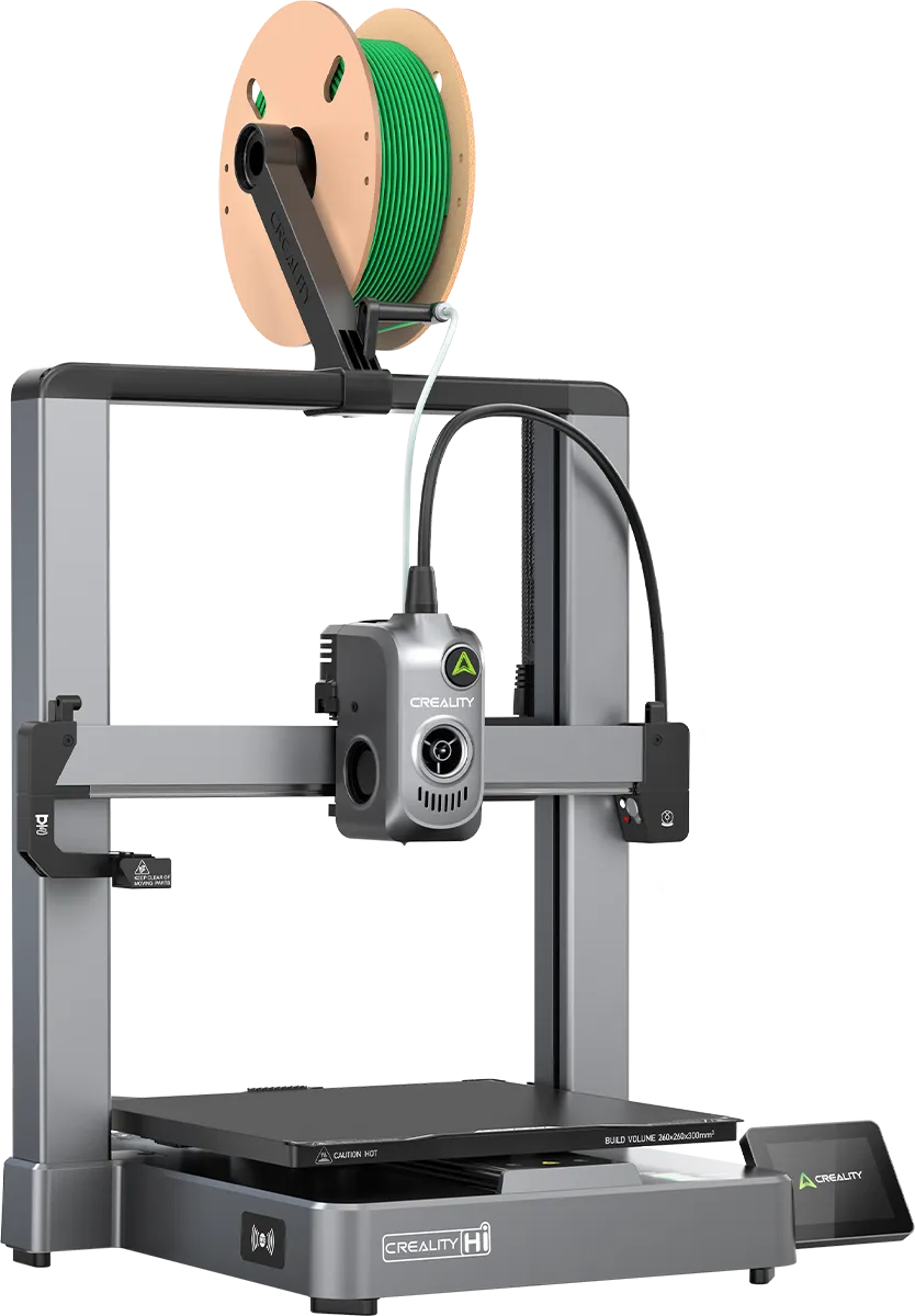 Close up of a 3D printer nozzle extruding green filament